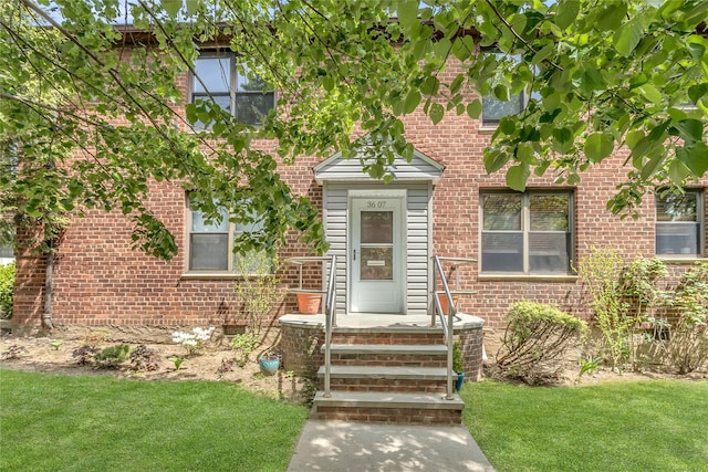 36-07 171st St Unit 36, Flushing, NY 11358 - property entrance with a lawn and brick siding