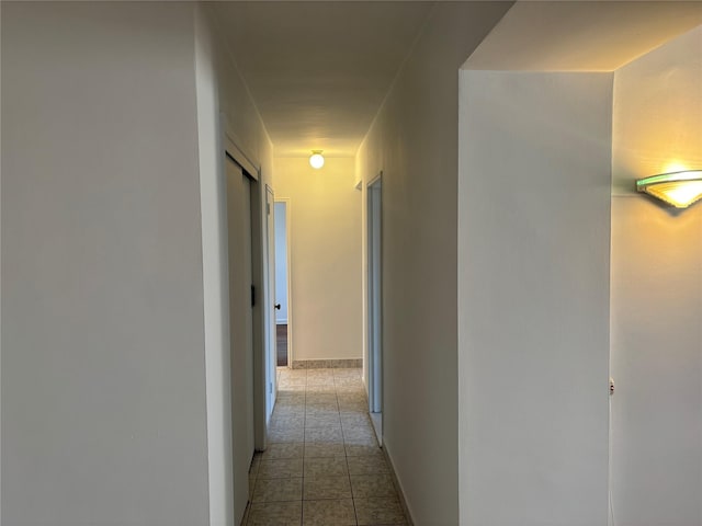 corridor with tile patterned floors
