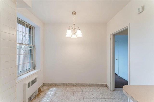 142-20 26th Ave Unit 5H, Flushing, NY 11354 - unfurnished dining area with radiator, a chandelier, baseboards, and light tile patterned flooring