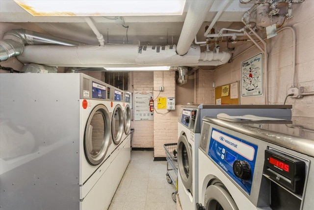 142-20 26th Ave Unit 5H, Flushing, NY 11354 - shared laundry featuring light floors and washer and clothes dryer