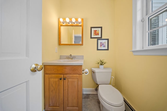 19 Donald St, East Williston, NY 11596 - half bathroom featuring toilet, vanity, and baseboards