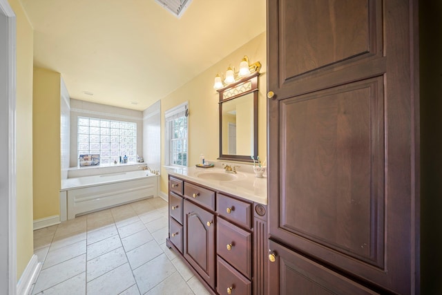 19 Donald St, East Williston, NY 11596 - bathroom featuring vanity, a bath, tile patterned flooring, and baseboards
