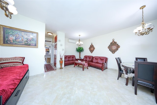 living area featuring a chandelier and a wall mounted air conditioner