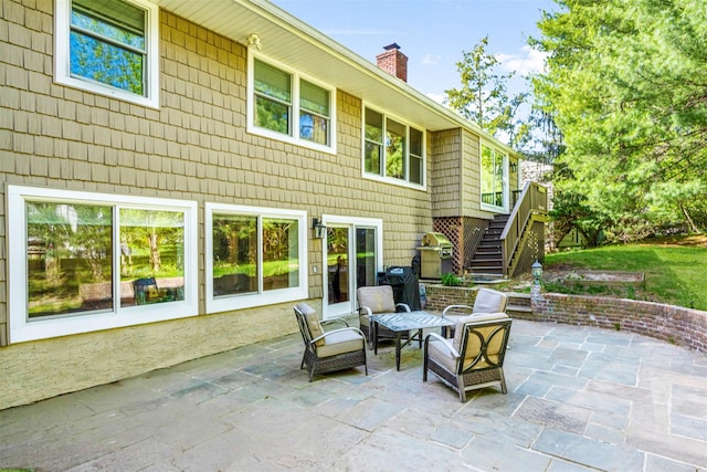 view of patio with stairway