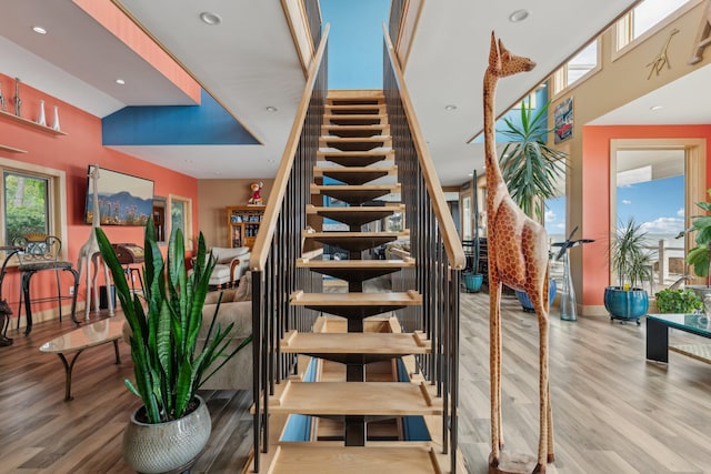 516 Asharoken Ave, Northport, NY 11768 - stairway with wood finished floors and recessed lighting
