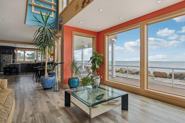 516 Asharoken Ave, Northport, NY 11768 - living area featuring a water view, wood finished floors, and recessed lighting