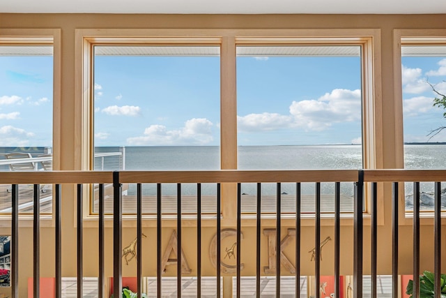 516 Asharoken Ave, Northport, NY 11768 - unfurnished sunroom featuring a water view