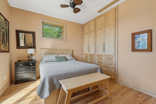 516 Asharoken Ave, Northport, NY 11768 - bedroom featuring light wood finished floors, baseboards, and a ceiling fan