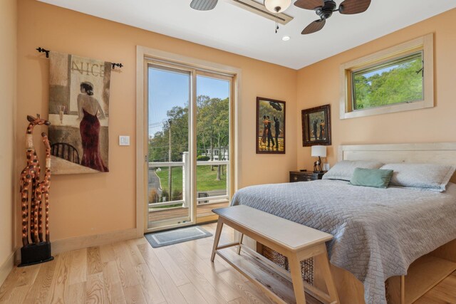 516 Asharoken Ave, Northport, NY 11768 - bedroom with access to exterior, wood finished floors, baseboards, recessed lighting, and ceiling fan