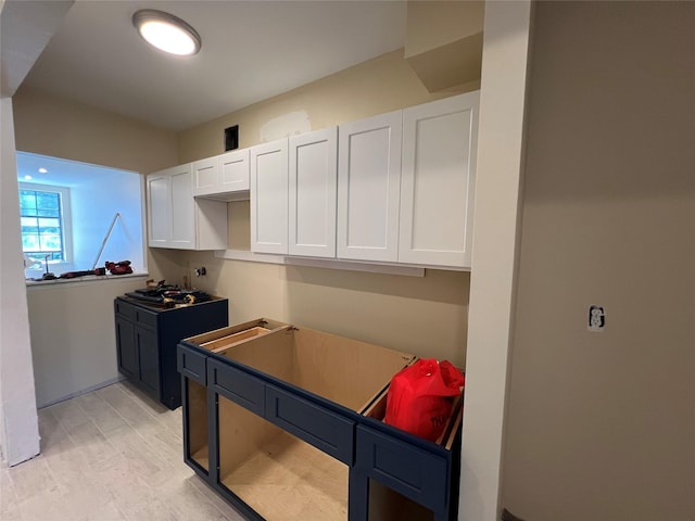 776 Brook Ave Unit 33C, Bronx, NY 10451 - kitchen featuring white cabinetry