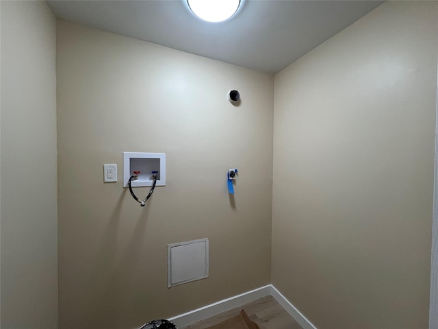 776 Brook Ave Unit 33C, Bronx, NY 10451 - laundry area featuring baseboards and washer hookup