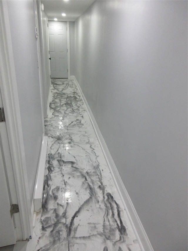 949 E 213th St, Bronx, NY 10469 - corridor featuring marble finish flooring and baseboards