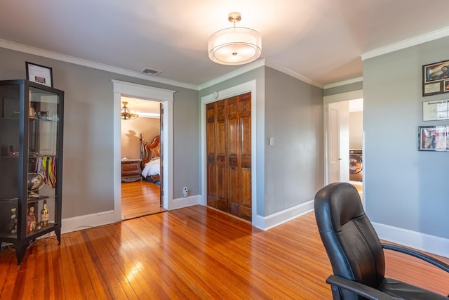 44 S Montgomery Ave, Bay Shore, NY 11706 - office space featuring hardwood / wood-style flooring, baseboards, and crown molding