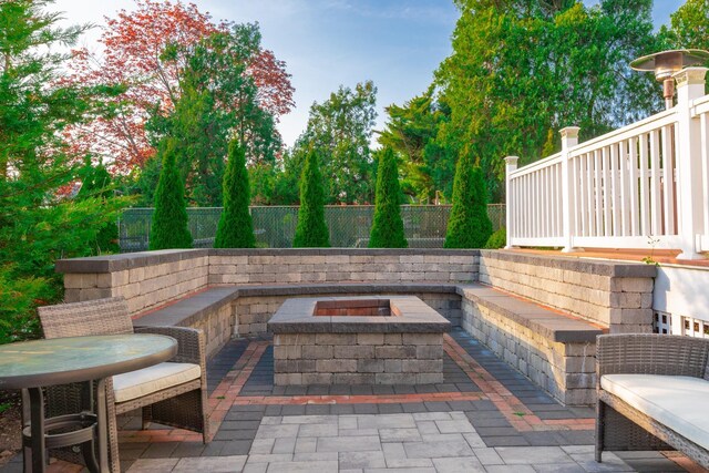 44 S Montgomery Ave, Bay Shore, NY 11706 - view of patio / terrace featuring a fire pit and a fenced backyard