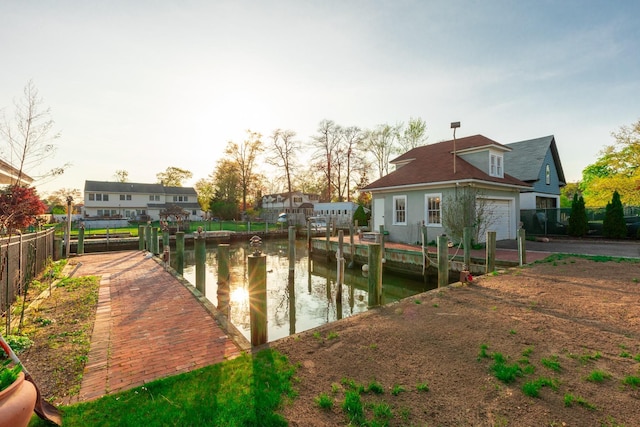 44 S Montgomery Ave, Bay Shore, NY 11706 - dock area featuring a water view and fence