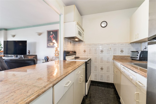 25-40 Shore Blvd Unit 6M, Astoria, NY 11102 - kitchen with white appliances, light stone countertops, and white cabinets