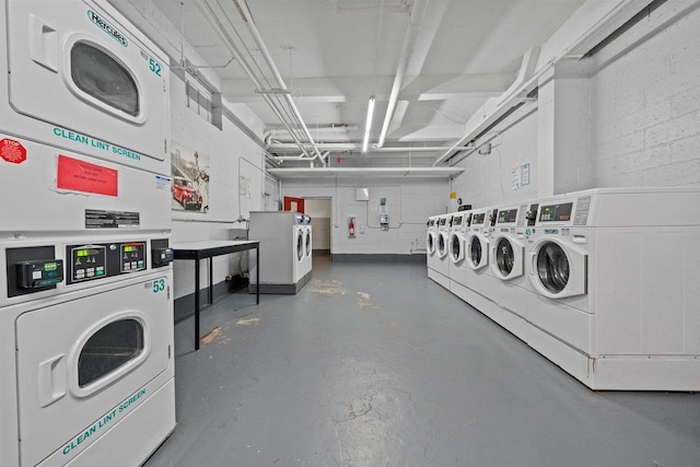 19 Abeel St Unit 6E, Yonkers, NY 10705 - community laundry room featuring stacked washer / drying machine, washing machine and dryer, and a garage