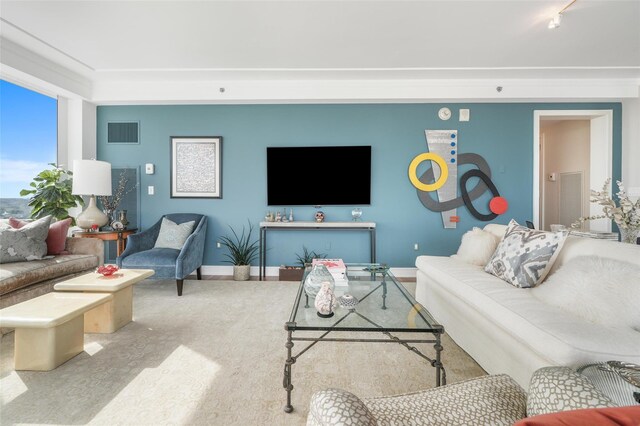 living room featuring visible vents and baseboards