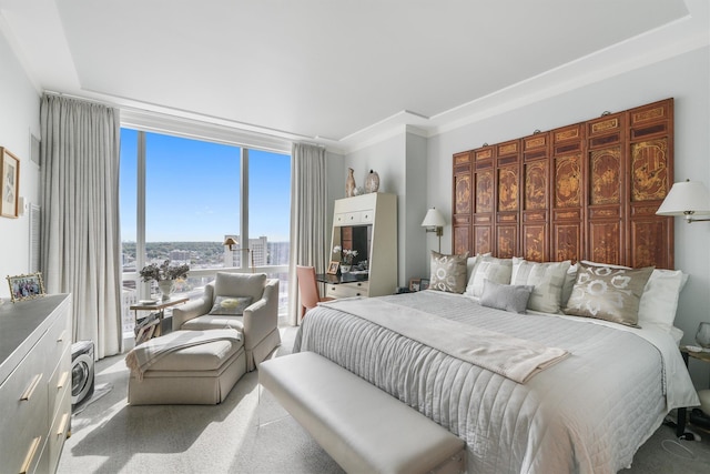 carpeted bedroom featuring expansive windows