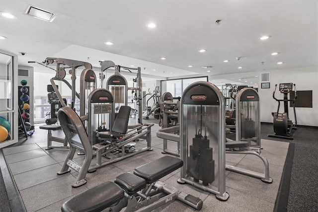 exercise room with recessed lighting and visible vents