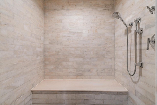 full bathroom featuring a tile shower