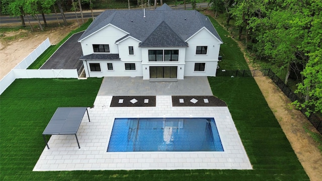 412 Mill River Rd, Oyster Bay, NY 11771 - back of property featuring a patio, a fenced backyard, a yard, and a balcony
