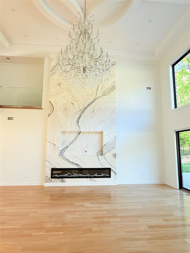 412 Mill River Rd, Oyster Bay, NY 11771 - details featuring baseboards, a notable chandelier, ornamental molding, and wood finished floors