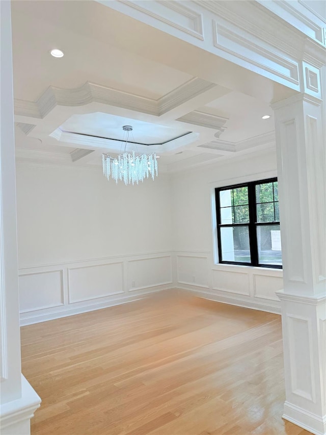 412 Mill River Rd, Oyster Bay, NY 11771 - unfurnished room featuring ornamental molding, coffered ceiling, a decorative wall, and a chandelier