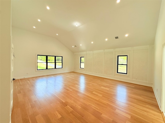 412 Mill River Rd, Oyster Bay, NY 11771 - unfurnished room featuring recessed lighting, high vaulted ceiling, baseboards, and light wood-type flooring