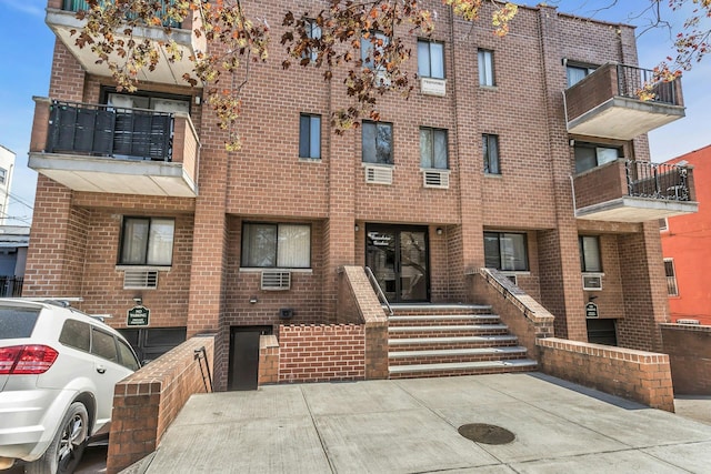 57-15 69th Ln # 2, Maspeth, NY 11378 - view of building exterior with cooling unit