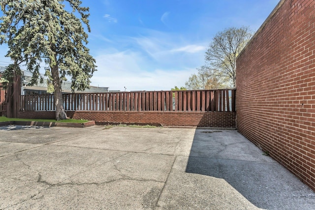 57-15 69th Ln # 2, Maspeth, NY 11378 - view of patio with a fenced backyard