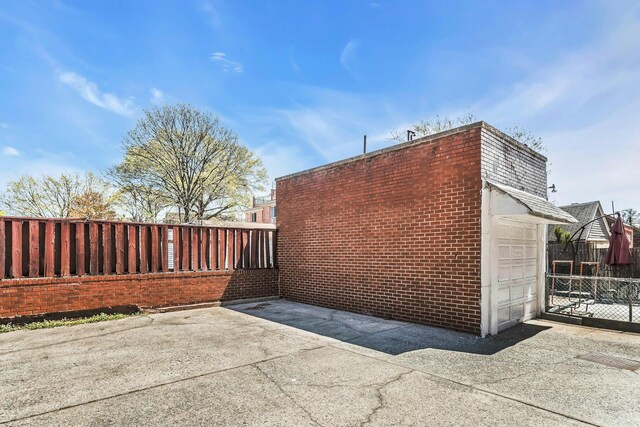 57-15 69th Ln # 2, Maspeth, NY 11378 - view of side of property featuring fence
