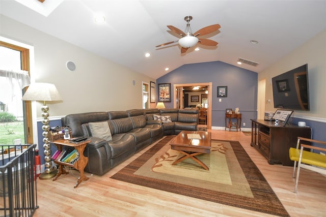 living area with a ceiling fan, lofted ceiling, light wood finished floors, and recessed lighting
