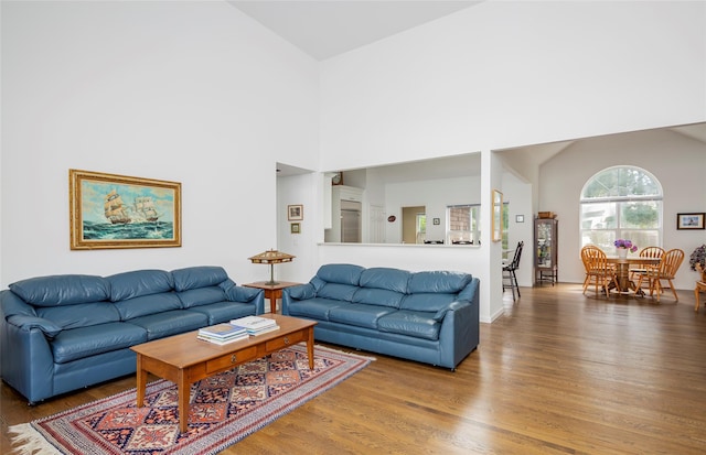 81 Lakeside Ln, Westhampton, NY 11977 - living area with high vaulted ceiling and wood finished floors