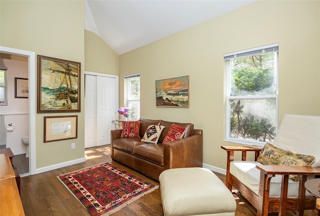 81 Lakeside Ln, Westhampton, NY 11977 - living room with baseboards, wood finished floors, a healthy amount of sunlight, and vaulted ceiling