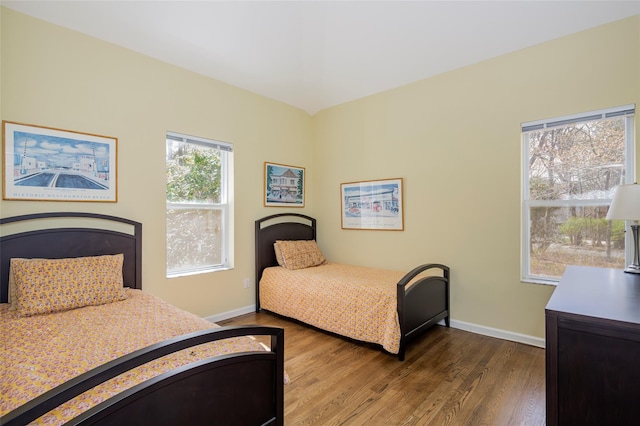 81 Lakeside Ln, Westhampton, NY 11977 - bedroom featuring baseboards and wood finished floors