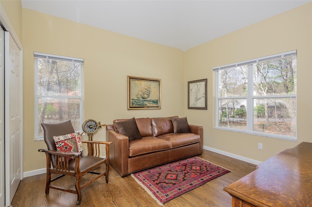 81 Lakeside Ln, Westhampton, NY 11977 - living room featuring a healthy amount of sunlight, baseboards, and wood finished floors