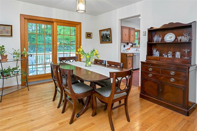dining room with light wood-style floors
