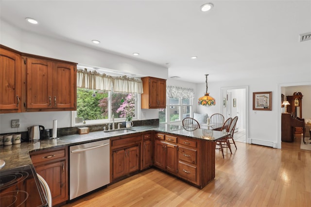5 Sandpiper Ct, Shoreham, NY 11786 - kitchen with dishwasher, a sink, a baseboard radiator, a peninsula, and brown cabinets