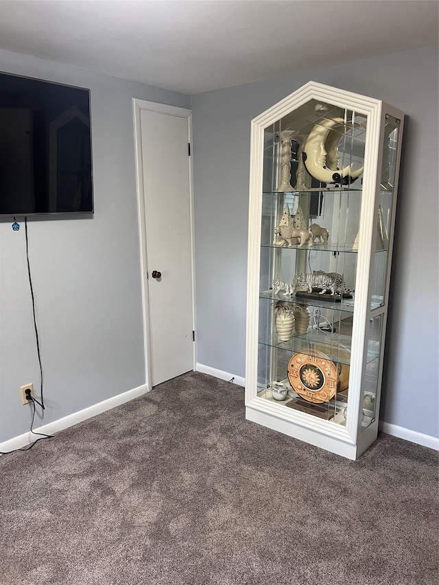 interior space featuring baseboards