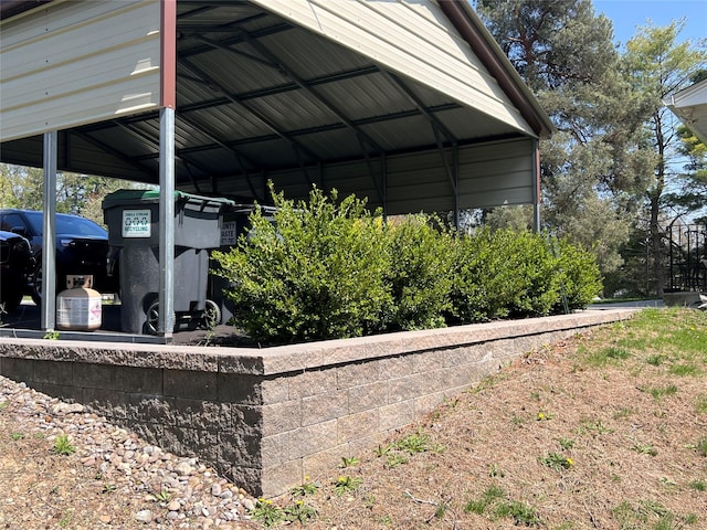 view of vehicle parking featuring a detached carport