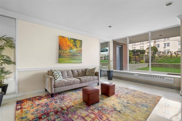 living area featuring baseboard heating and recessed lighting