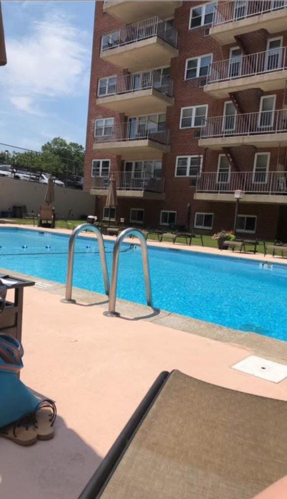 pool featuring a patio area
