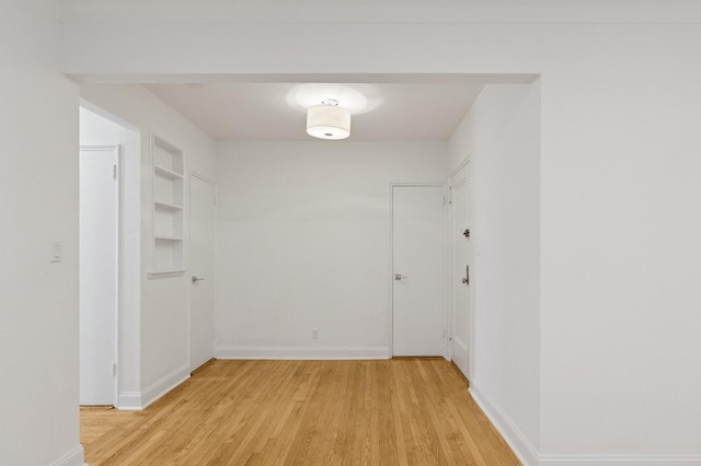 90 Park Ter E Unit 3G, New York Manhattan, NY 10034 - spare room with built in features, baseboards, and light wood-type flooring