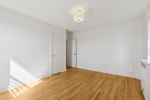 90 Park Ter E Unit 3G, New York Manhattan, NY 10034 - unfurnished room featuring baseboards and light wood-type flooring
