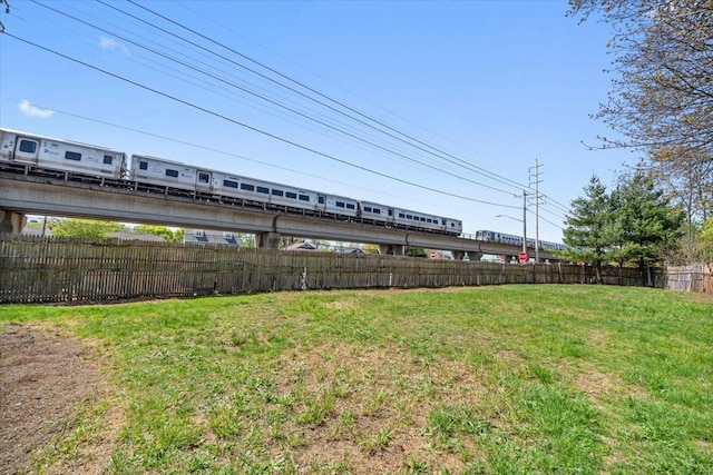view of yard featuring fence
