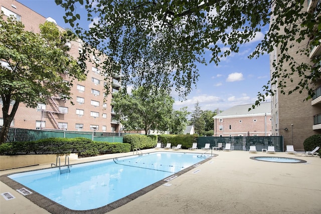 377 Westchester Ave Unit 6C, Port Chester, NY 10573 - community pool featuring a community hot tub