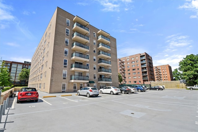377 Westchester Ave Unit 6C, Port Chester, NY 10573 - view of apartment building / complex featuring uncovered parking