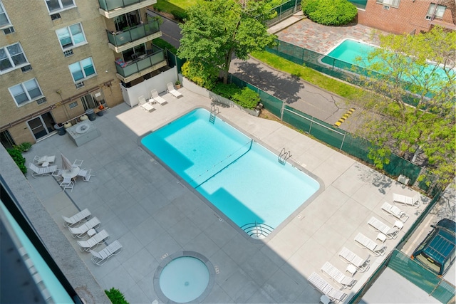 377 Westchester Ave Unit 6C, Port Chester, NY 10573 - community pool with a patio area