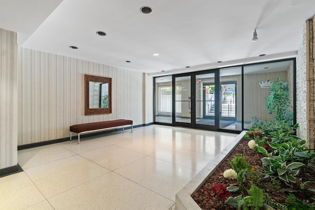 377 Westchester Ave Unit 6C, Port Chester, NY 10573 - building lobby with wallpapered walls and recessed lighting